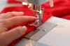 Alfabet needlewoman: mærkning linjer på symaskinen